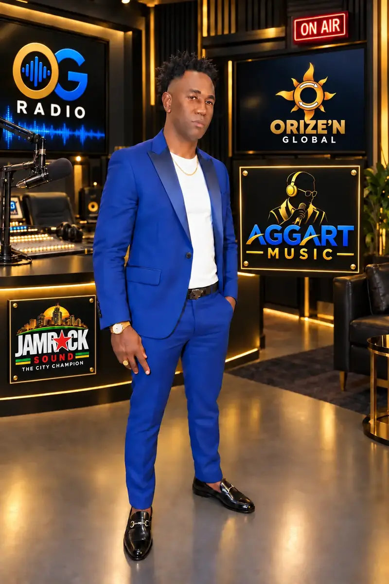 Aggart in the OG Radio studio with Aggart Music and Jamrock Sound branding