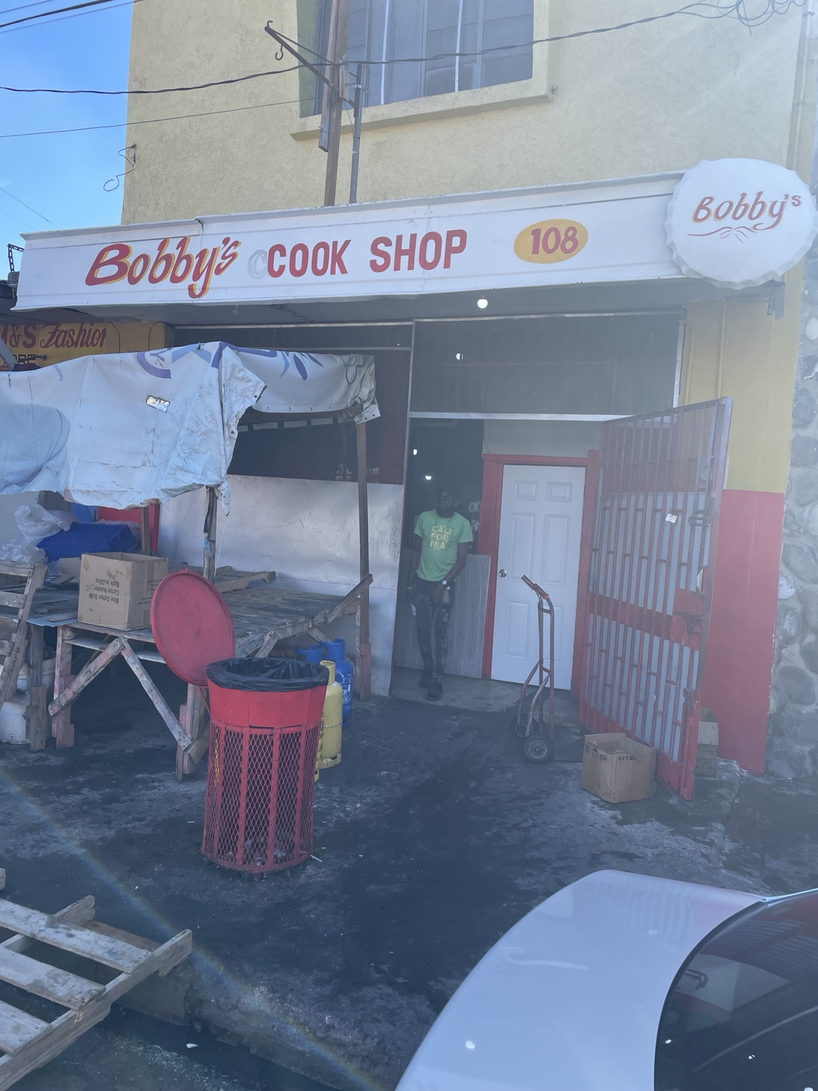 Bobby’s Cook Shop storefront, marked 108